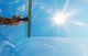 Person cleaning a window with a squeegee [Image by creator ghazii from AdobeStock]