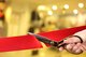 Person holding scissors cutting a red ribbon [Image by creator Africa Studio from AdobeStock]