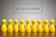 A line of 9 equal yellow game pieces under the word, "Standard" [Image by creator MichaelJBerlin from AdobeStock]